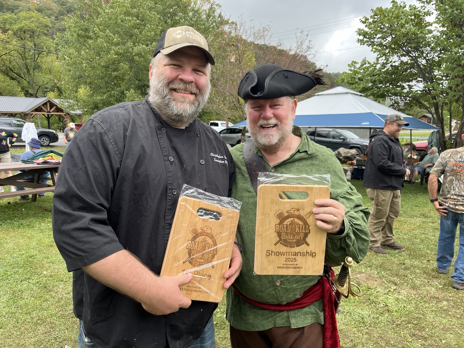 Chris Sachs (left) and Ed Blackford (right) with Coal Hollow Brothers’ First Place and Showmanship awards at the 2025 West Virginia RoadKill Cook-Off.